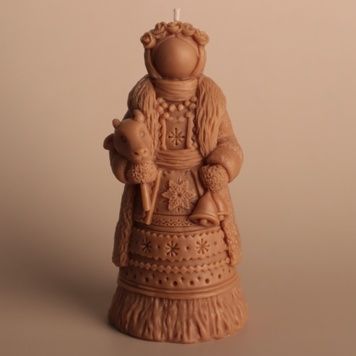 Свічка Берегиня Різдва коричнева &mdash; фото Wax Harmony